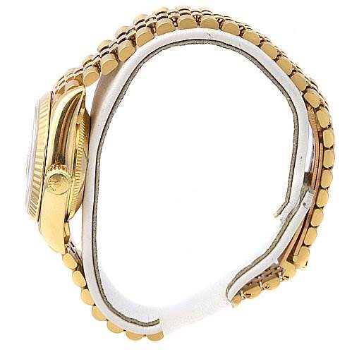 The image shows a side view of a Rolex President 69178 Women's Yellow Gold Champagne Dial 69178 Women's Yellow Gold Champagne Dial model watch, highlighting the gold case, crown, and linked bracelet.