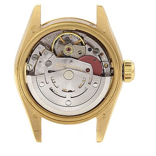This image shows the back view of the Rolex President 69178 Women's Yellow Gold Champagne Dial 69178 Women's Yellow Gold Champagne Dial model, highlighting its internal mechanical parts.