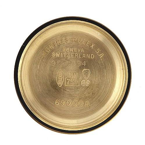 This image shows the inside of the case back from a Rolex President 69178 Women's Yellow Gold Champagne Dial 69178 Women's Yellow Gold Champagne Dial model, featuring branding and model information.