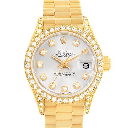 This image shows a Rolex President 69158 Women's Yellow Gold Silver Dial 69158 Women's Yellow Gold Silver Dial model watch, featuring a gold bracelet, diamond bezel, and white dial with date display.