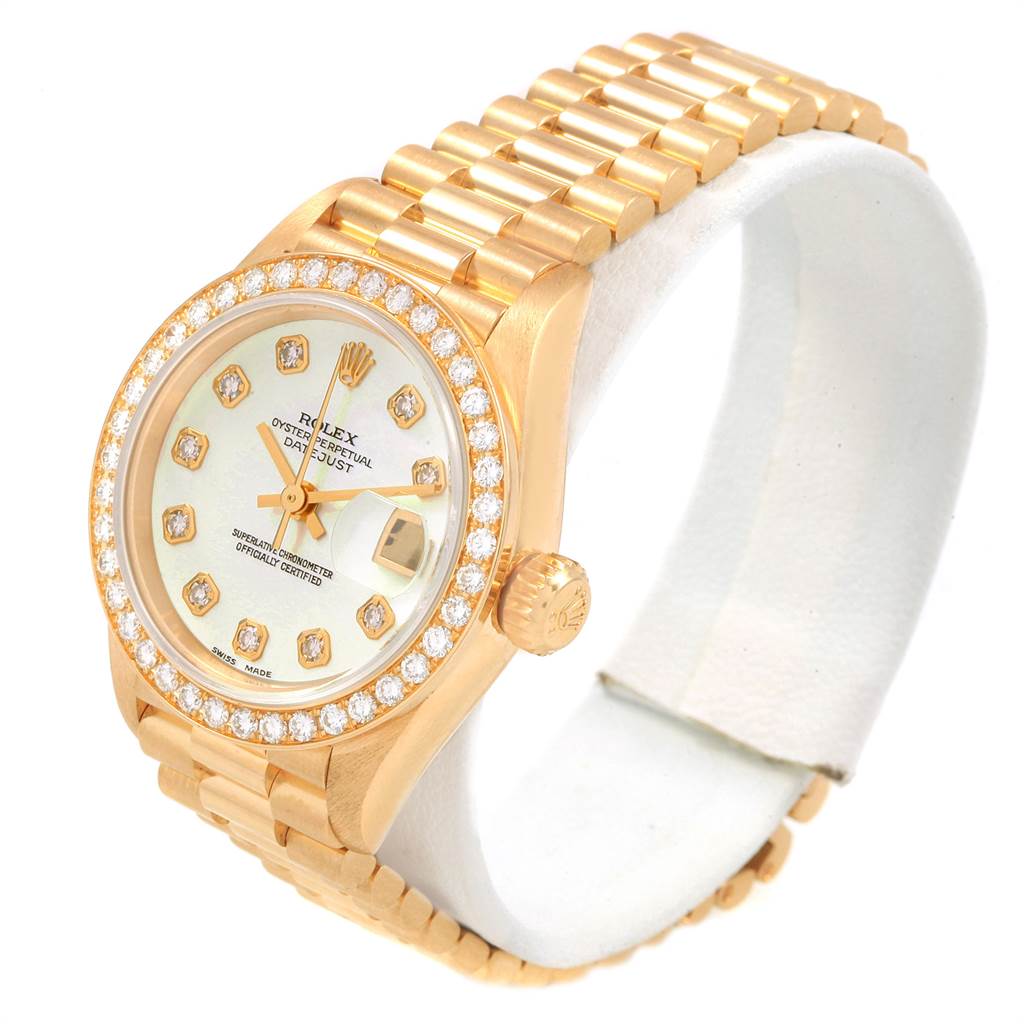 The Rolex President 69138 Women's Yellow Gold Mother of Pearl Dial 69138 Women's Yellow Gold Mother of Pearl Dial model watch is shown at a slight angle, displaying the face, bezel, crown, and bracelet.