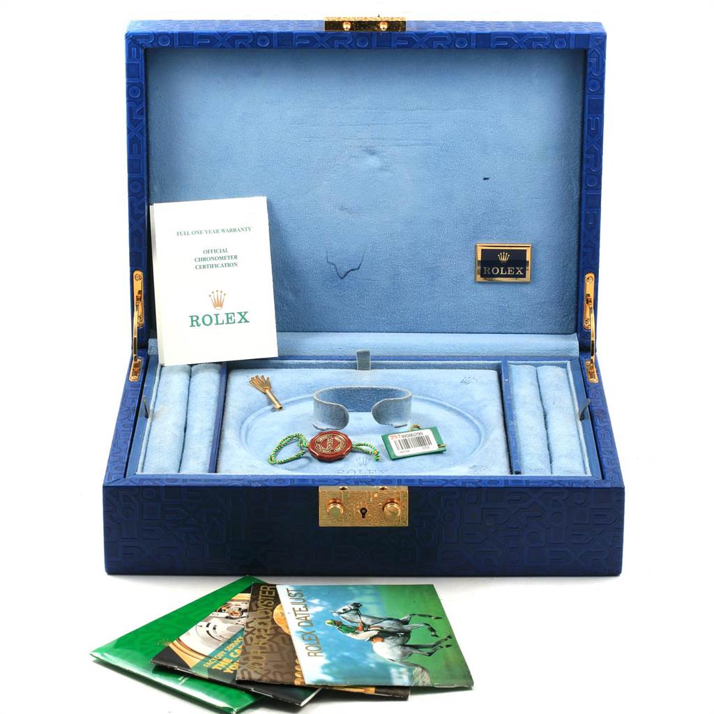 The image shows a Rolex President 69138 Women's Yellow Gold Mother of Pearl Dial 69138 Women's Yellow Gold Mother of Pearl Dial model watch box with booklets, a warranty card, and watch tags.