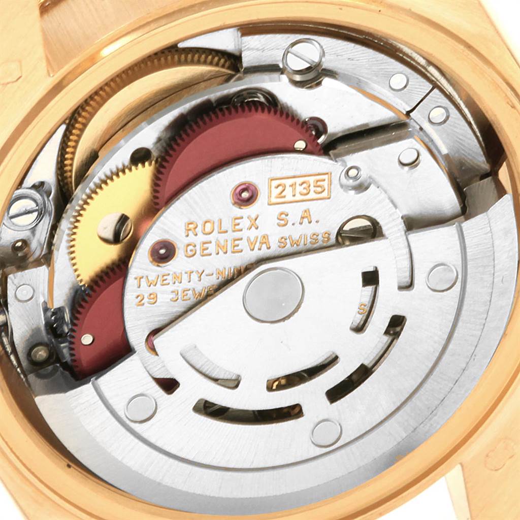 The image shows an internal view of the Rolex President 69138 Women's Yellow Gold Mother of Pearl Dial 69138 Women's Yellow Gold Mother of Pearl Dial model watch, highlighting its mechanical movement components.