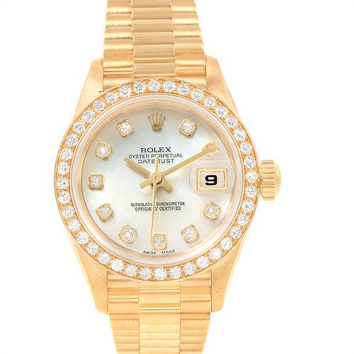 This image shows a front view of the watch face and band of a Rolex President 69138 Women's Yellow Gold Mother of Pearl Dial 69138 Women's Yellow Gold Mother of Pearl Dial model, highlighting the date window and diamond bezel.