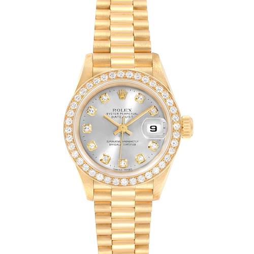 The Rolex President 69138 Women's Yellow Gold Silver Dial 69138 Women's Yellow Gold Silver Dial model watch is shown from a front angle, showcasing its gold bracelet, diamond-encrusted bezel, and silver dial with a date display.