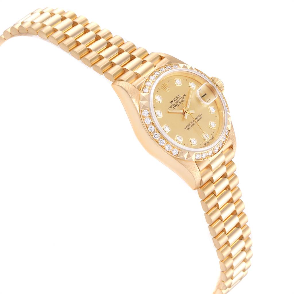 The image shows a Rolex President 69268 Women's Yellow Gold Champagne Dial 69268 Women's Yellow Gold Champagne Dial model watch, angled to display the face, bezel, and part of the gold bracelet.