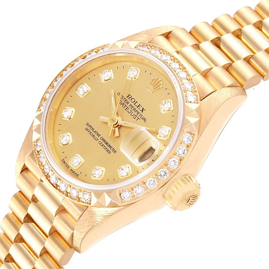 The image shows a close-up angle of a Rolex President 69268 Women's Yellow Gold Champagne Dial 69268 Women's Yellow Gold Champagne Dial watch, highlighting its dial, crown, bezel, and part of the bracelet.