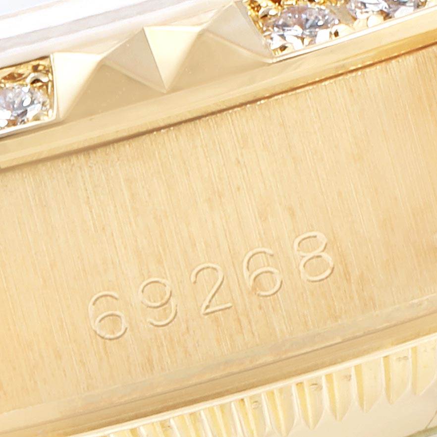 Close-up of the Rolex President 69268 Women's Yellow Gold Champagne Dial 69268 Women's Yellow Gold Champagne Dial model watch showing the model number 69268 engraved on the gold case.