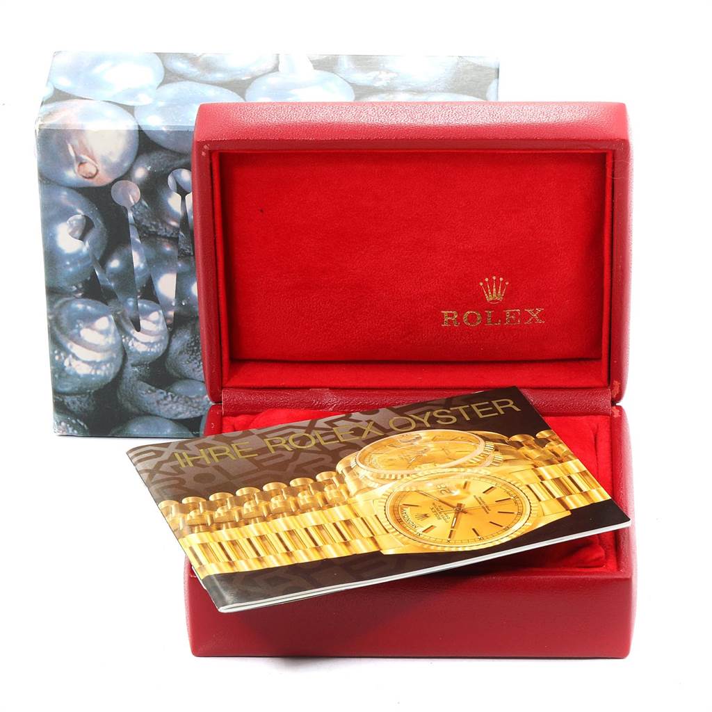 The image shows the Rolex President 69268 Women's Yellow Gold Champagne Dial 69268 Women's Yellow Gold Champagne Dial model watch's box and a brochure, viewed from the front and slightly above.