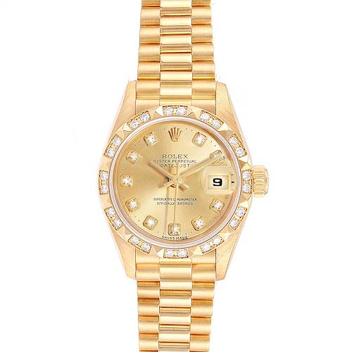 The Rolex President 69258 Women's Yellow Gold Champagne Dial 69258 Women's Yellow Gold Champagne Dial model watch is shown from a top-down angle, displaying its gold bracelet, diamond-set bezel, and dial.