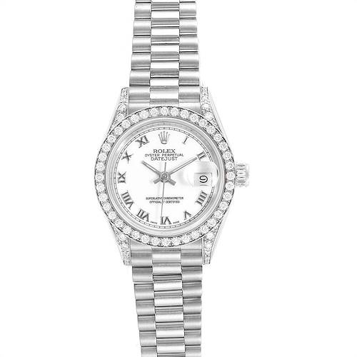 The image shows a Rolex President 69159 Women's White Gold White Dial 69159 Women's White Gold White Dial model watch from a top view, showcasing its diamond bezel, white dial, and bracelet.
