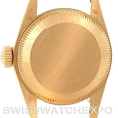 This image shows the back case and crown of a Rolex President 67188 Women's Yellow Gold Blue Dial 67188 Women's Yellow Gold Blue Dial model watch viewed from the rear.