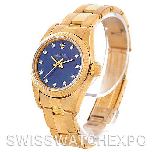 The Rolex President 67198 Women's Yellow Gold Blue Dial 67198 Women's Yellow Gold Blue Dial model watch is shown at a three-quarter angle, displaying its gold bracelet, blue dial with diamond markers, and fluted bezel.