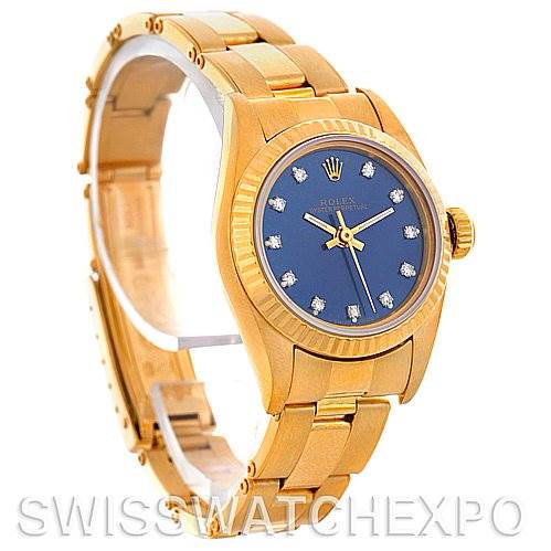 The image shows a side angle of the Rolex President 67198 Women's Yellow Gold Blue Dial 67198 Women's Yellow Gold Blue Dial model watch, highlighting its gold case, bracelet, and blue diamond-accented dial.