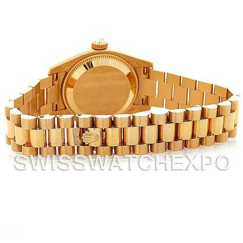 The image shows the back view of a Rolex President 179178 Women's Yellow Gold Silver Dial 179178 Women's Yellow Gold Silver Dial model watch, highlighting the case back and bracelet.