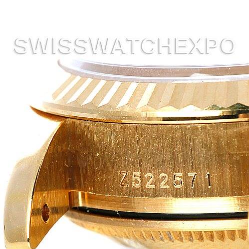 This image shows a side view of the bezel and case, including the serial number, of a Rolex President 179178 Women's Yellow Gold Silver Dial 179178 Women's Yellow Gold Silver Dial model watch.
