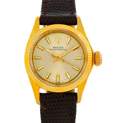The image shows a front view of a Rolex President 6719 Women's Yellow Gold Champagne Dial 6719 Women's Yellow Gold Champagne Dial model watch, displaying its gold casing, dial, and brown leather strap.