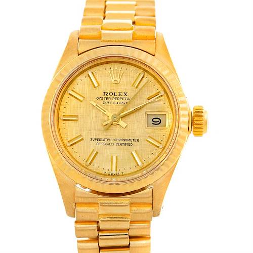 The image shows a front view of a Rolex President 6917 Women's Yellow Gold Champagne Dial 6917 Women's Yellow Gold Champagne Dial model watch with a gold bracelet and a date window.