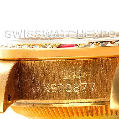 This close-up image of a Rolex President 69068 Women's Yellow Gold Mother of Pearl Dial 69068 Women's Yellow Gold Mother of Pearl Dial model watch shows the serial number engraved on the gold case.