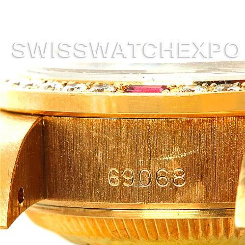 The image shows a close-up of the side and bezel of a Rolex President 69068 Women's Yellow Gold Mother of Pearl Dial 69068 Women's Yellow Gold Mother of Pearl Dial model watch, highlighting the serial number.