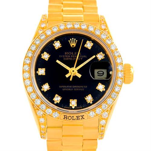 The image shows a Rolex President 69158 Women's Yellow Gold Black Dial 69158 Women's Yellow Gold Black Dial model watch, captured from a front angle, highlighting its face, bezel, and part of the bracelet.