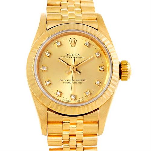 This is a close-up, front-facing view of the Rolex President 67198 Women's Yellow Gold Champagne Dial 67198 Women's Yellow Gold Champagne Dial watch, featuring the dial, bezel, crown, and part of the bracelet.