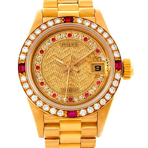 The image shows a front view of a Rolex President 69178 Women's Yellow Gold Champagne Dial 69178 Women's Yellow Gold Champagne Dial model watch with a gold dial, diamond and ruby accents, and a date display.