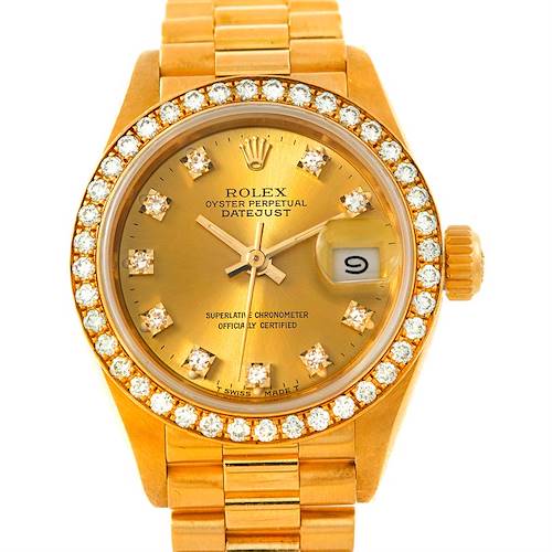 The image shows a close-up of the Rolex President 69138 Women's Yellow Gold Champagne Dial 69138 Women's Yellow Gold Champagne Dial model watch, highlighting its gold dial, diamond markers, and bezel.