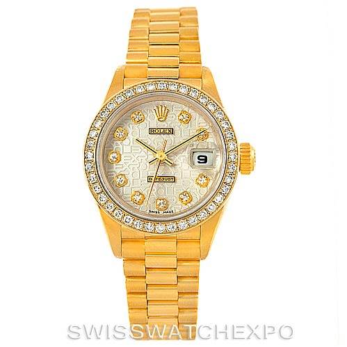 The Rolex President 69138 Women's Yellow Gold Beige Dial 69138 Women's Yellow Gold Beige Dial model watch is shown from a front angle, highlighting its dial, bezel, bracelet, and crown.