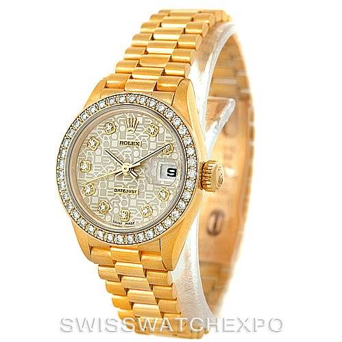 This image shows a Rolex President 69138 Women's Yellow Gold Beige Dial 69138 Women's Yellow Gold Beige Dial model watch in a three-quarter view, highlighting its gold bracelet, bezel, dial, and date display.