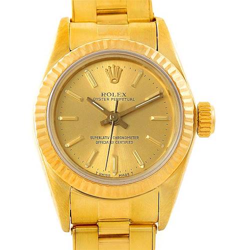 The image shows a frontal view of a gold Rolex President 67197 Women's Yellow Gold Champagne Dial 67197 Women's Yellow Gold Champagne Dial model watch, displaying the dial, crown, bezel, and part of the bracelet.