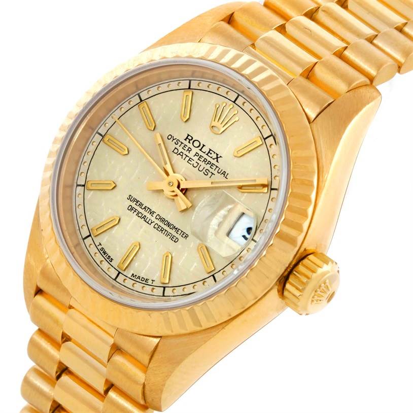 This image shows a close-up, side angle of the Rolex President 69178 Women's Yellow Gold Beige Dial 69178 Women's Yellow Gold Beige Dial model watch, highlighting its dial, bezel, and bracelet.