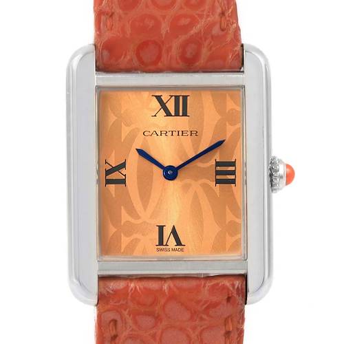 The image shows a close-up of the Cartier Tank Solo W1019455 Women's Stainless Steel Orange Dial W1019455 Women's Stainless Steel Orange Dial watch face and part of the orange strap from a front angle.