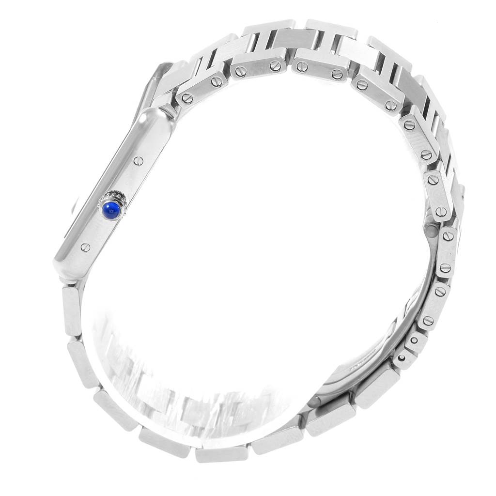 The image shows a side view of the Cartier Tank Solo W5200013 Women's Stainless Steel Silver Dial W5200013 Women's Stainless Steel Silver Dial watch, highlighting its metal bracelet and crown with a blue cabochon.