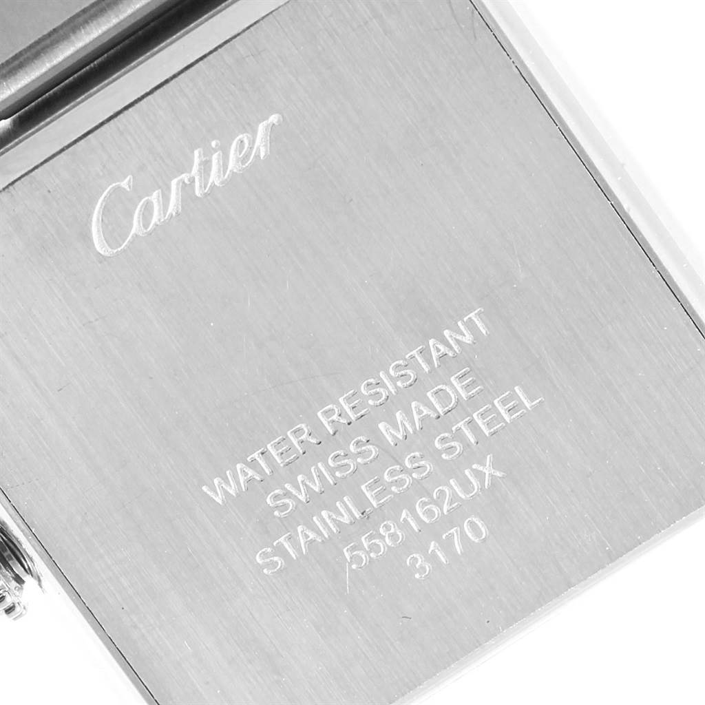 The image shows the engraved case back of the Cartier Tank Solo W5200013 Women's Stainless Steel Silver Dial W5200013 Women's Stainless Steel Silver Dial watch, detailing its water resistance, Swiss origin, and materials.