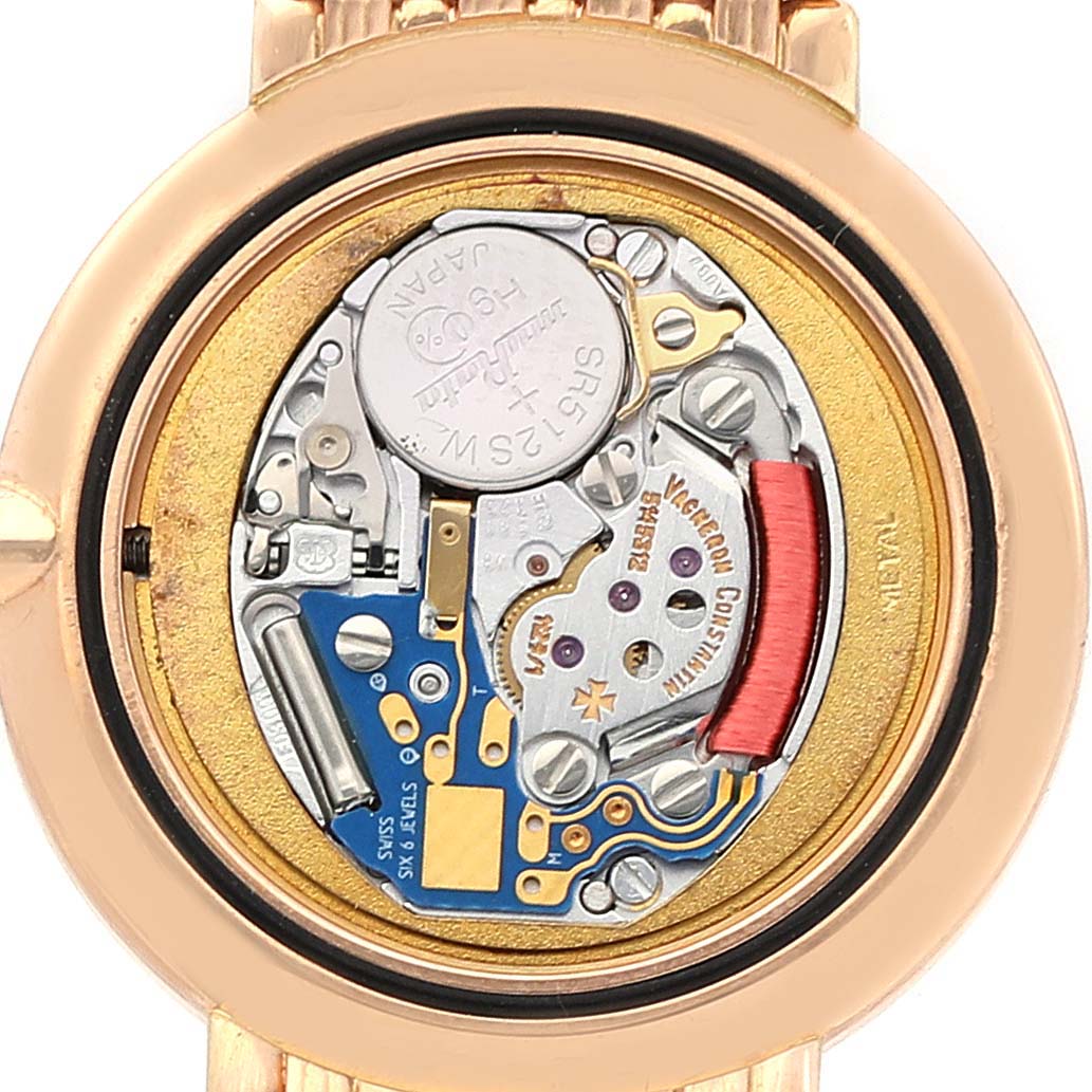 The image shows the back view of the Vacheron Constantin Traditionnelle 27593 Women's Rose Gold White Dial 27593 Women's Rose Gold White Dial watch, revealing its intricate internal mechanisms.