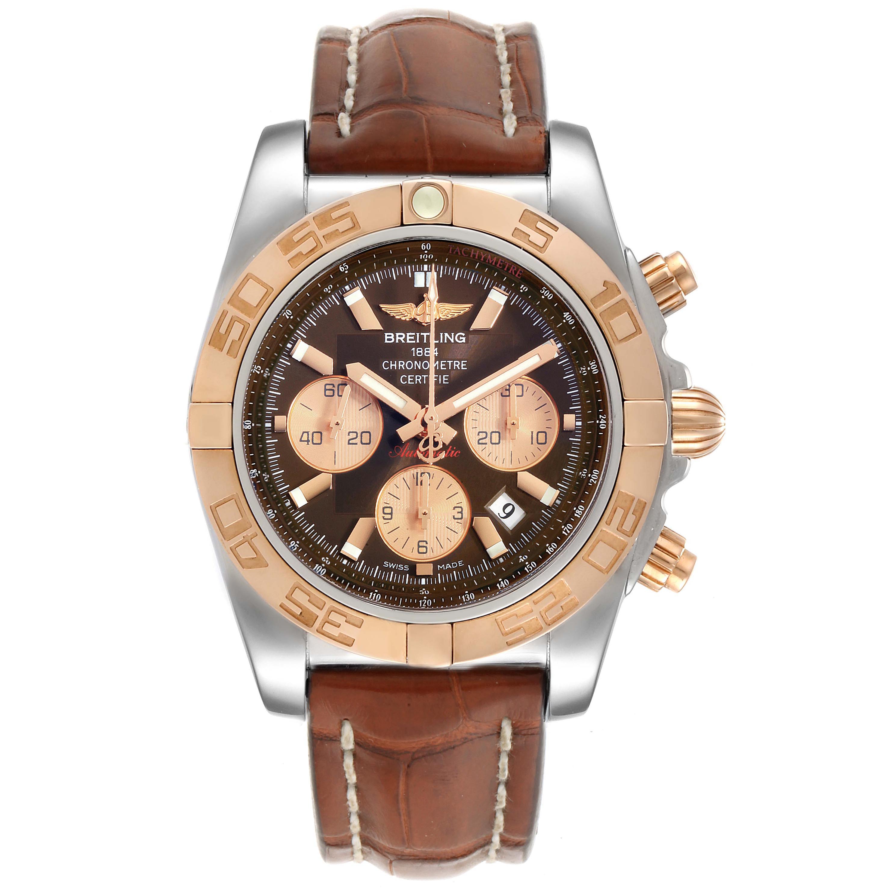 The image shows a front view of a Breitling Chronomat CB0110 Men's Steel and Gold (two tone) Brown Dial CB0110 Men's Steel and Gold (two tone) Brown Dial watch with a leather strap, gold bezel, and multiple chronograph dials.