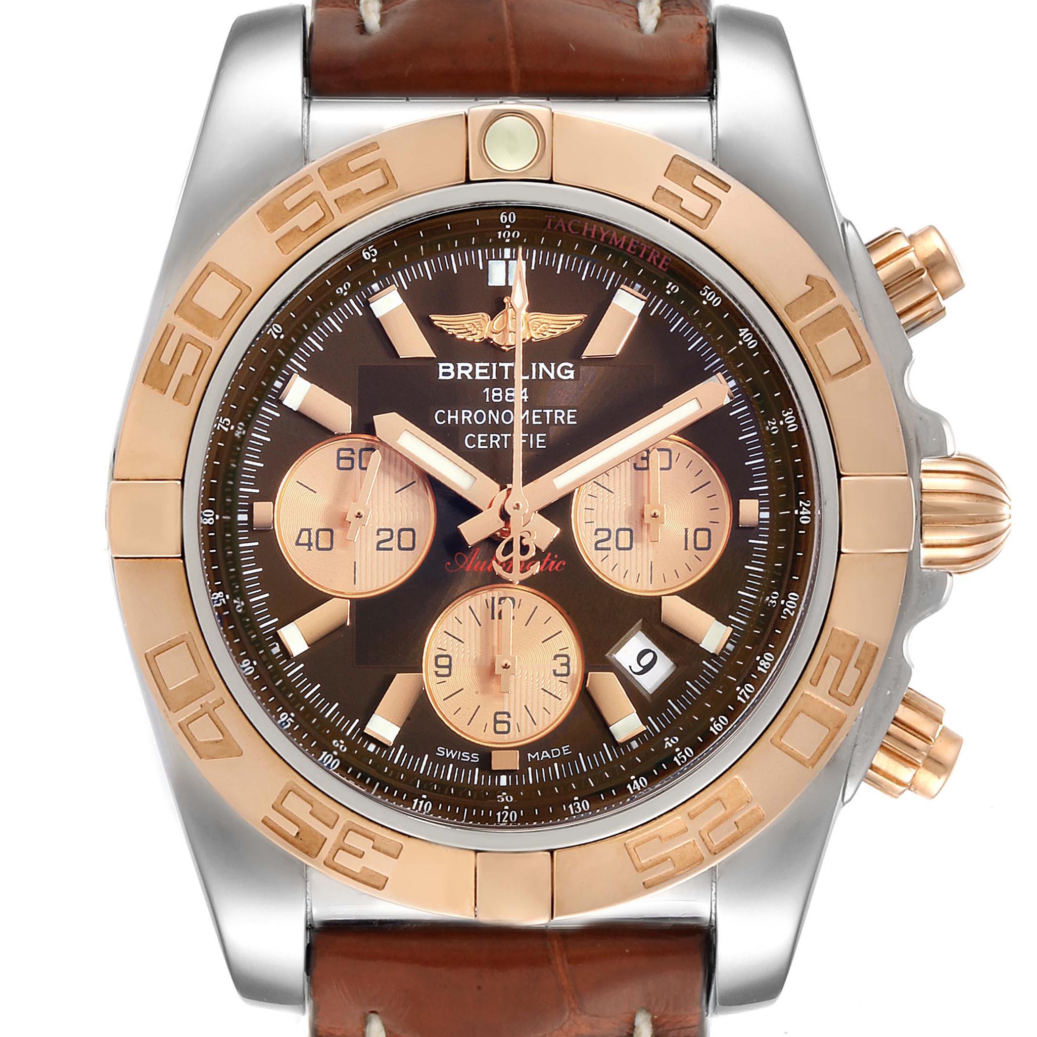 This Breitling Chronomat CB0110 Men's Steel and Gold (two tone) Brown Dial CB0110 Men's Steel and Gold (two tone) Brown Dial watch is shown from a front angle, featuring its dial, bezel, sub-dials, hands, and part of the leather strap.