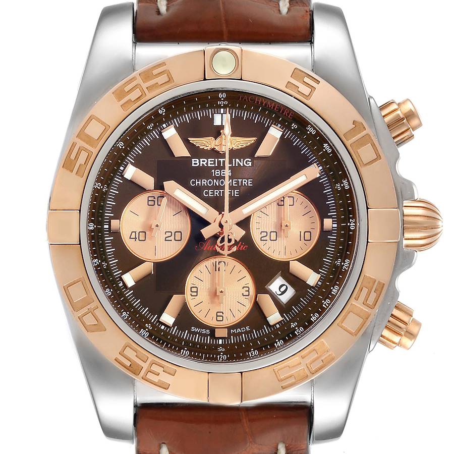 This Breitling Chronomat CB0110 Men's Steel and Gold (two tone) Brown Dial CB0110 Men's Steel and Gold (two tone) Brown Dial watch is shown from a front angle, featuring its dial, bezel, sub-dials, hands, and part of the leather strap.