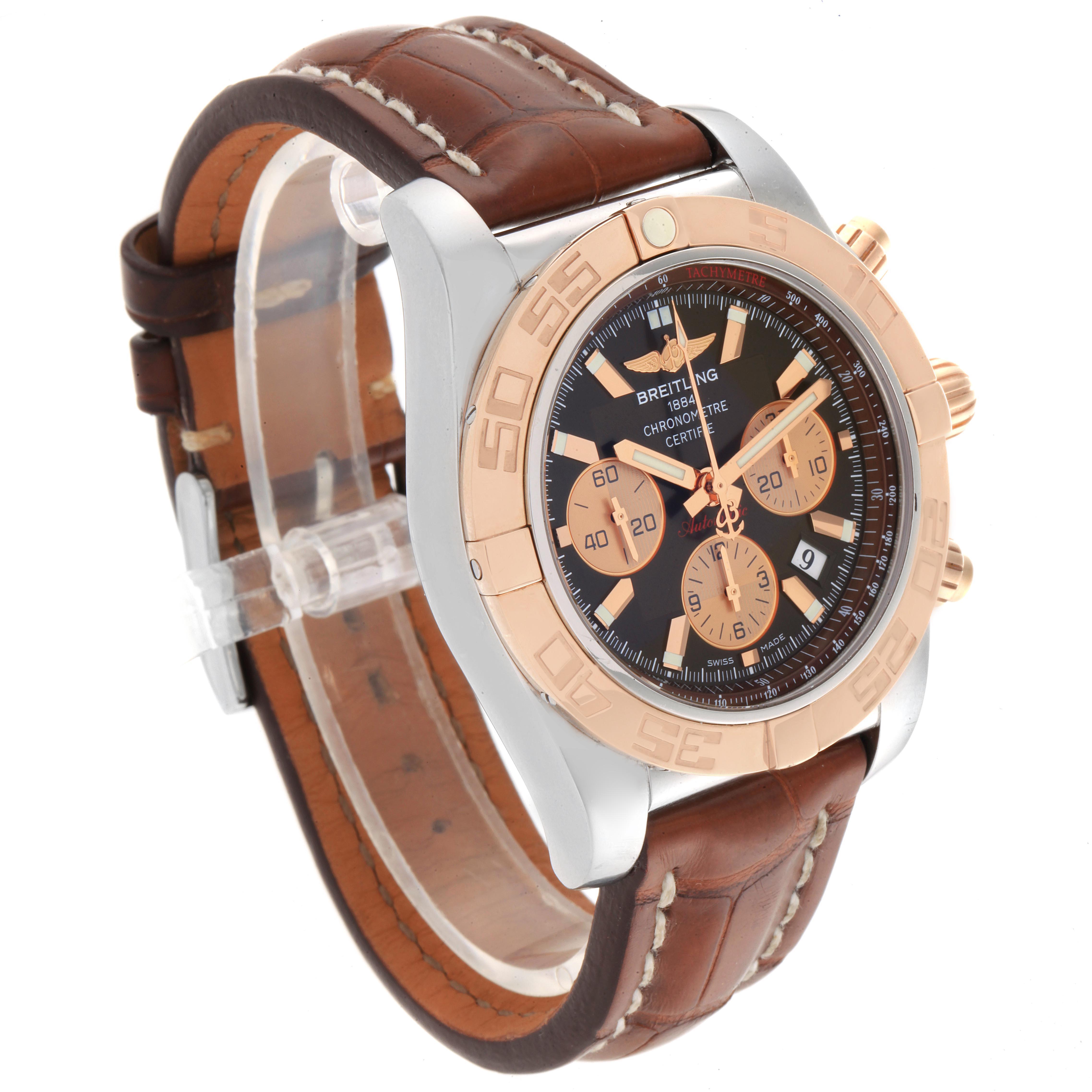 The Breitling Chronomat CB0110 Men's Steel and Gold (two tone) Brown Dial CB0110 Men's Steel and Gold (two tone) Brown Dial watch is shown at a three-quarter angle, displaying the dial, bezel, chronograph subdials, and leather strap.