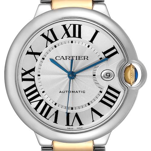 This image shows a frontal view of a Ballon Bleu model watch by Cartier, highlighting its dial, silver case, and blue hands.