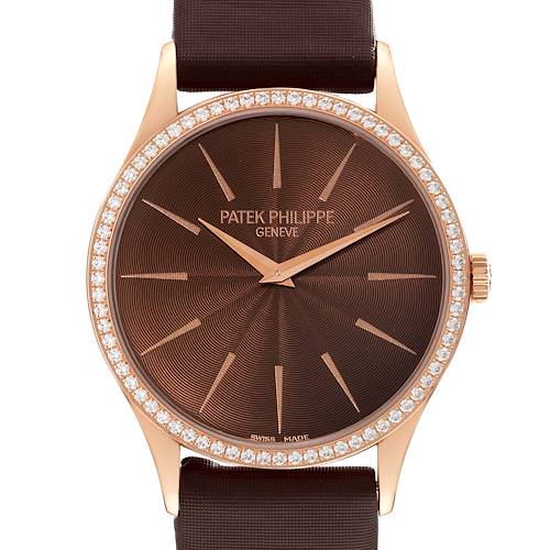 The image shows a frontal view of the Patek Philippe Calatrava 4897R-001 Women's Rose Gold Brown Dial 4897R-001 Women's Rose Gold Brown Dial watch, highlighting its diamond bezel, brown dial, and strap.