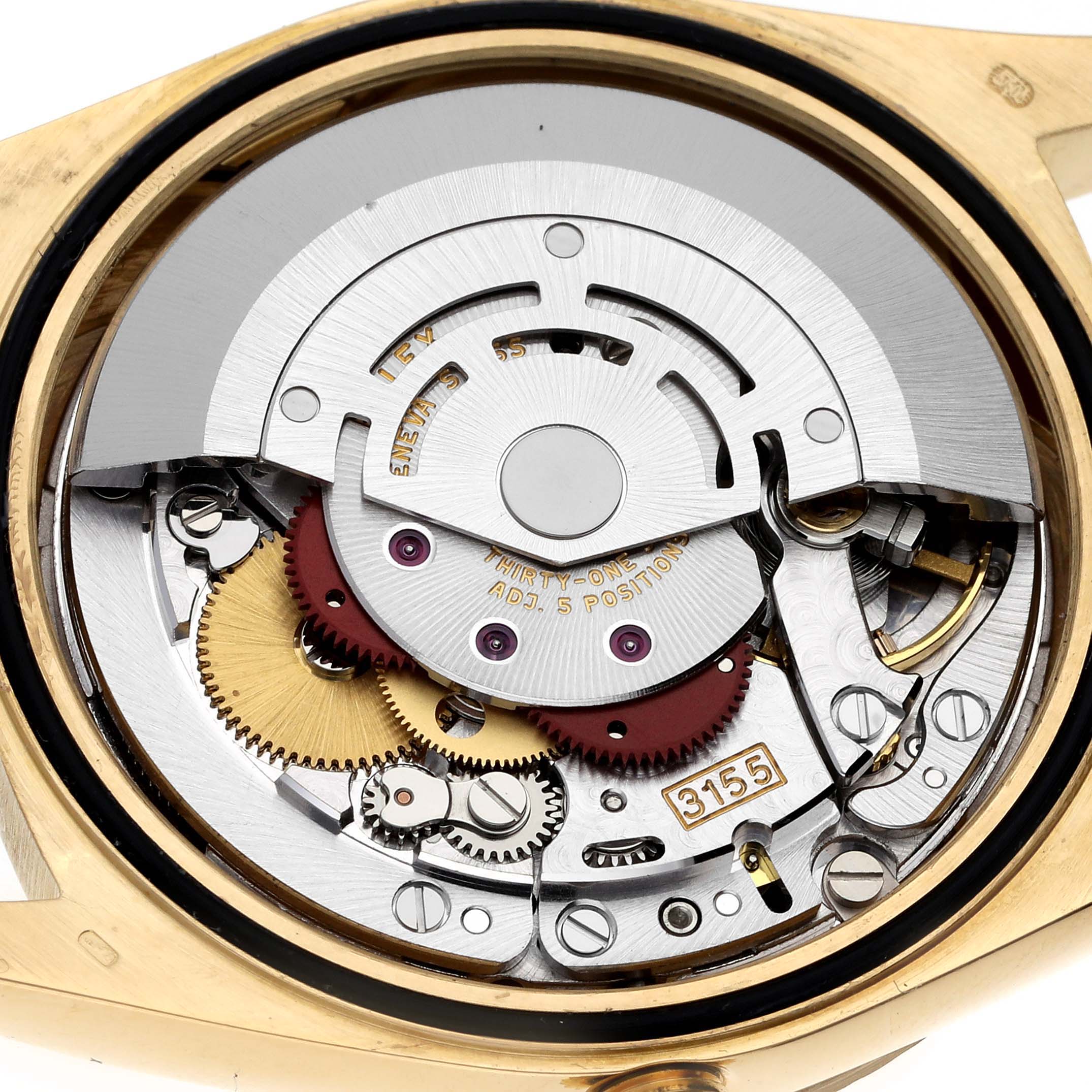 This image shows the internal mechanism of the Rolex President 18238 Men's Yellow Gold Mother of Pearl Dial 18238 Men's Yellow Gold Mother of Pearl Dial model watch from a close-up, top-down angle.