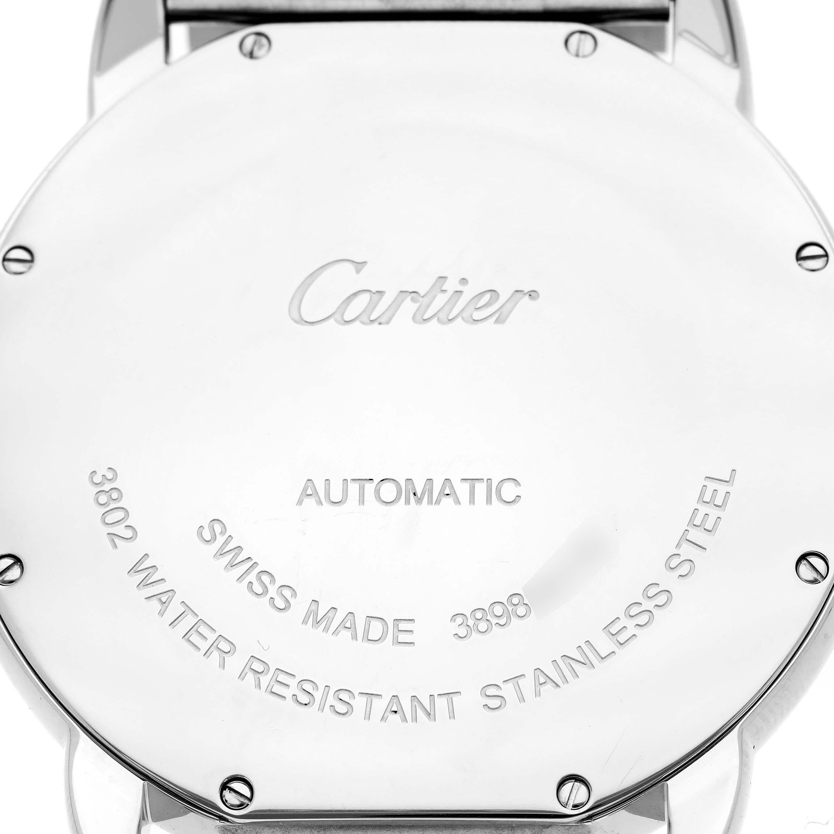 The image shows the back case of a Cartier Ronde WSRN0023 Men's Stainless Steel Blue Dial WSRN0023 Men's Stainless Steel Blue Dial watch, displaying engravings and screws.