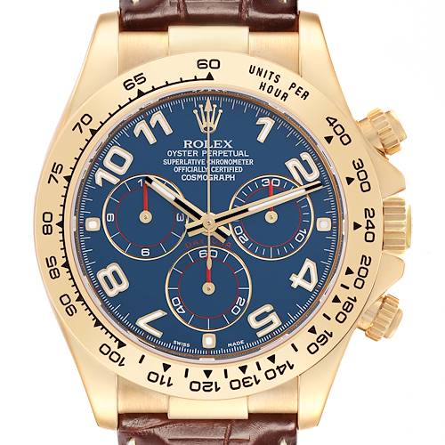 The Rolex Daytona 116518 Men's Yellow Gold Blue Dial 116518 Men's Yellow Gold Blue Dial watch is shown from a frontal angle, highlighting its blue dial, gold bezel, and brown leather strap.