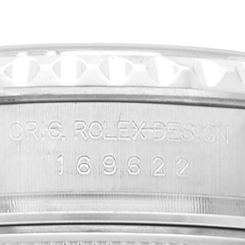 Close-up view of the side of a Rolex Yacht-Master 169622 Women's Stainless Steel Silver Dial 169622 Women's Stainless Steel Silver Dial watch showing the model number and part of the bezel.