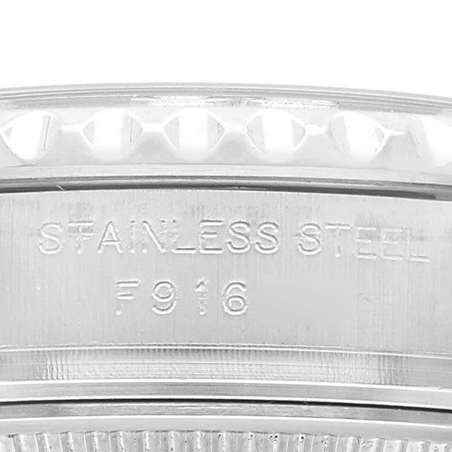 This image shows a close-up of the serial number and stainless steel engraving on the side of a Rolex Yacht-Master 169622 Women's Stainless Steel Silver Dial 169622 Women's Stainless Steel Silver Dial watch case.