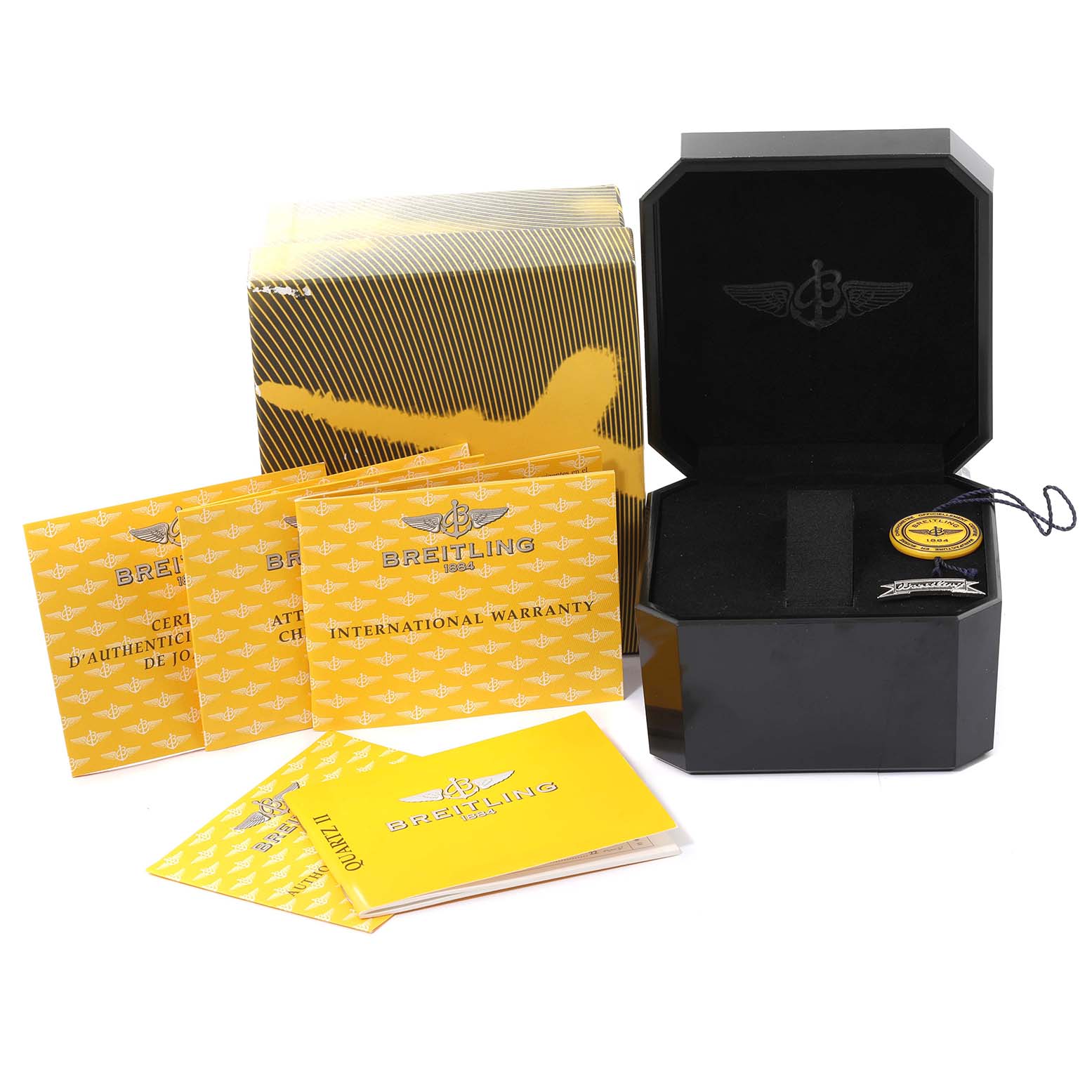 This image shows the packaging, warranty, and certificates of the Breitling A57350 Women's Stainless Steel Silver Dial A57350 Women's Stainless Steel Silver Dial Colt Oceane Silver Dial Diamond Steel Ladies Watch A57350.