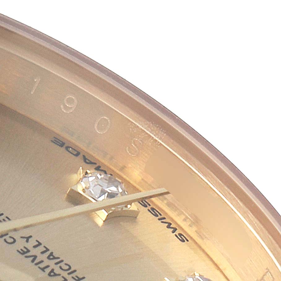 This close-up image of a Rolex President 279178 Women's Yellow Gold Champagne Dial 279178 Women's Yellow Gold Champagne Dial watch shows the dial with a diamond marker and part of the bezel with "1905" and "Swiss Made" visible.