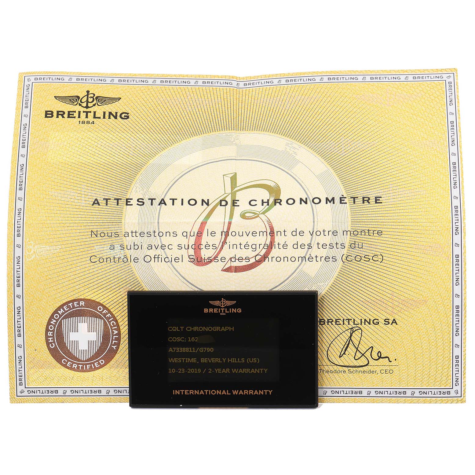 The image shows a Breitling Colt A73388 Men's Stainless Steel White Dial A73388 Men's Stainless Steel White Dial model's chronometer certificate and international warranty card displayed flat.